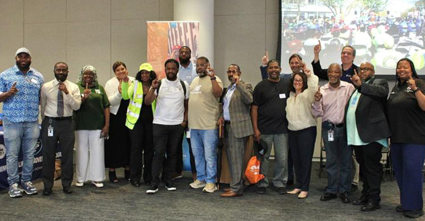 Interfaith leaders and community organizers unite for a group photo, celebrating the successful expansion of the PHL Taking Care of Business program at Temple University’s Student Center, Friday. — TRIBUNE PHOTOs / IMANI WATERS