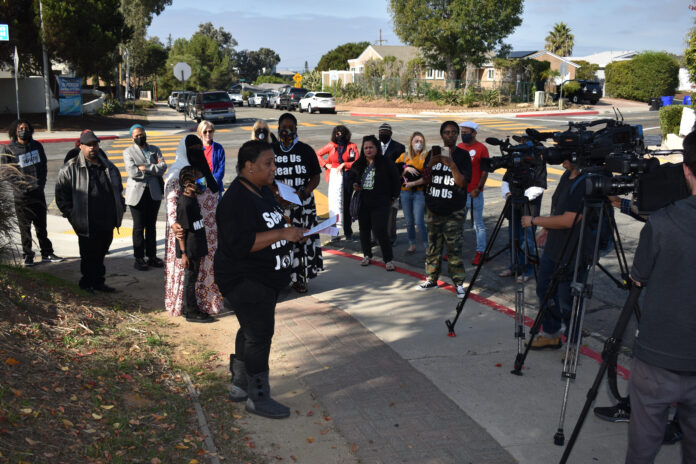 Latasha Williamson, organizer, speaks to the crowd.