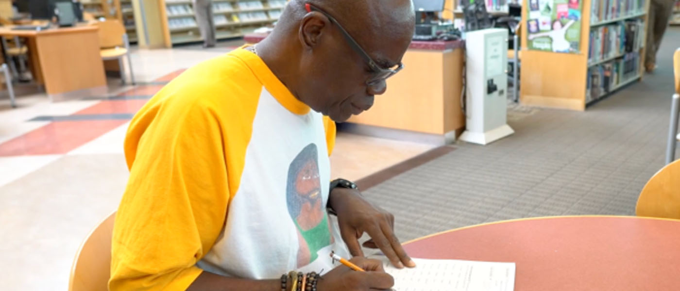 Gregory Hill, a former student of the Los Angeles Public Library adult literacy program. Screenshot from LA Public Library/YouTube. Credit: LA Public Library