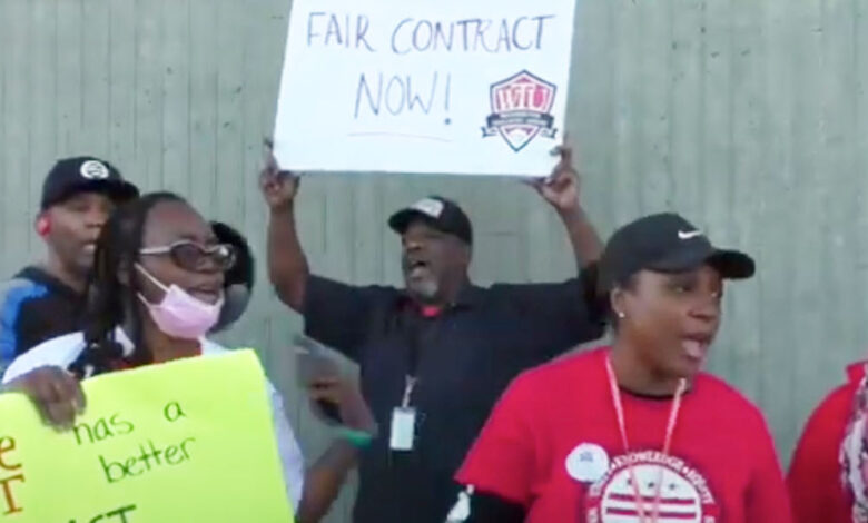 Teachers with the Washington Teachers' Union march for a new contract in front of the Anacostia Metro Station. (Courtesy of WTU)