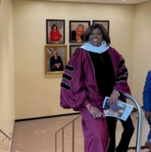 Dr. Suzan Johnson Cook in front of the induction photos alone. (Courtesy photo)