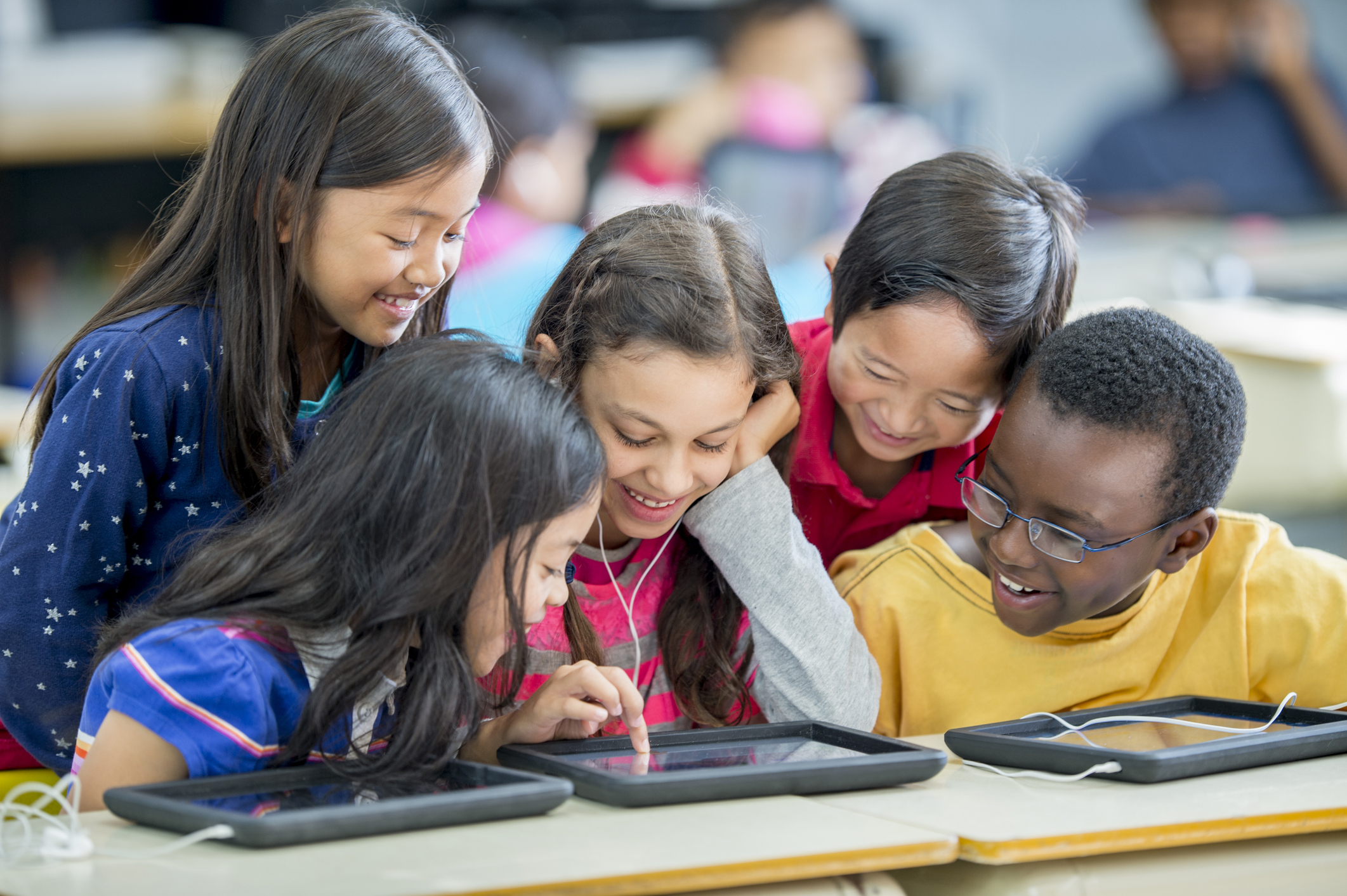 Children Playing Games On A Tablet NNPA ESSA MEDIA CAMPAIGN children-playing-games-on-a-tablet-nnpa-essa-media-campaign