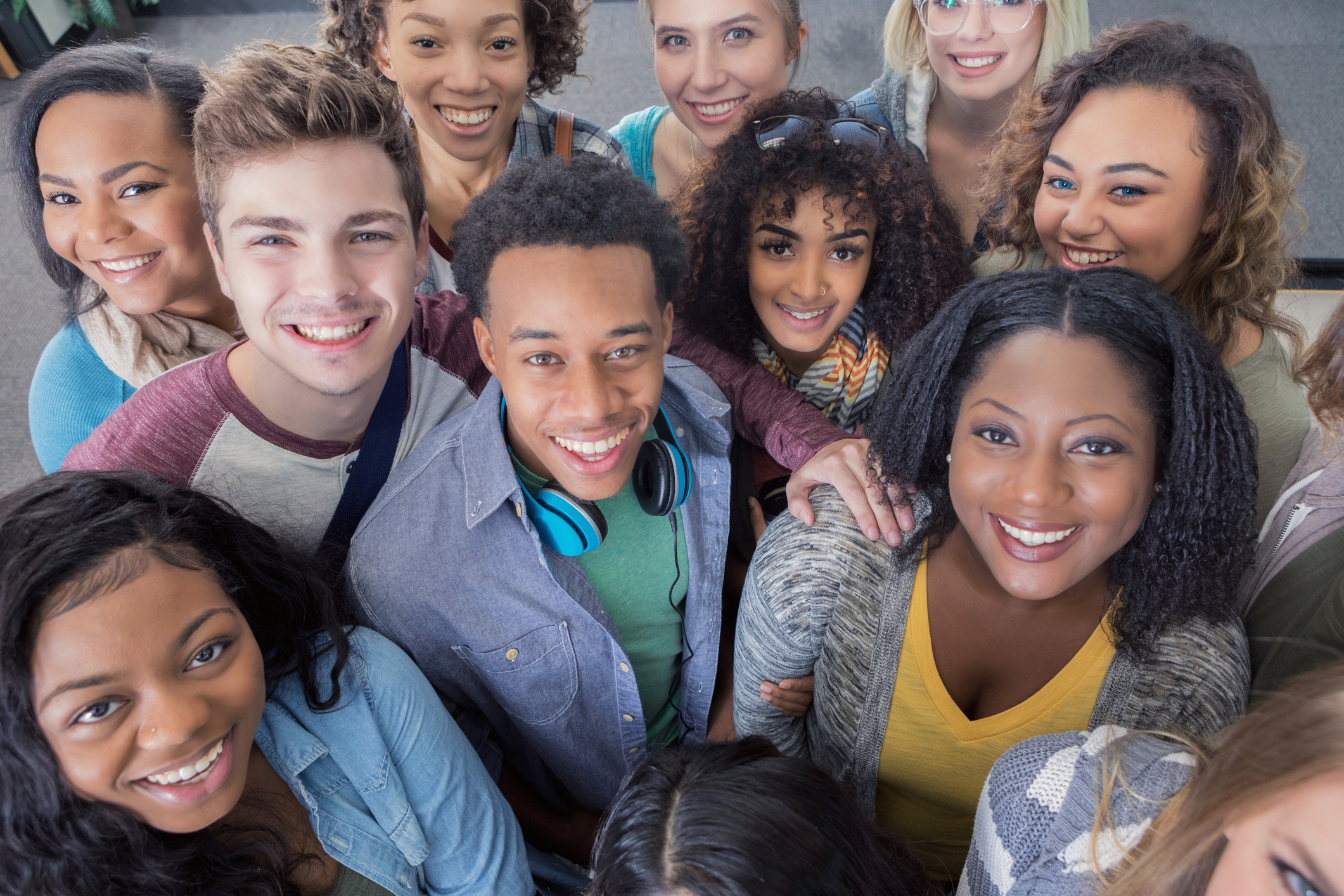 Diverse group of smiling young adults.