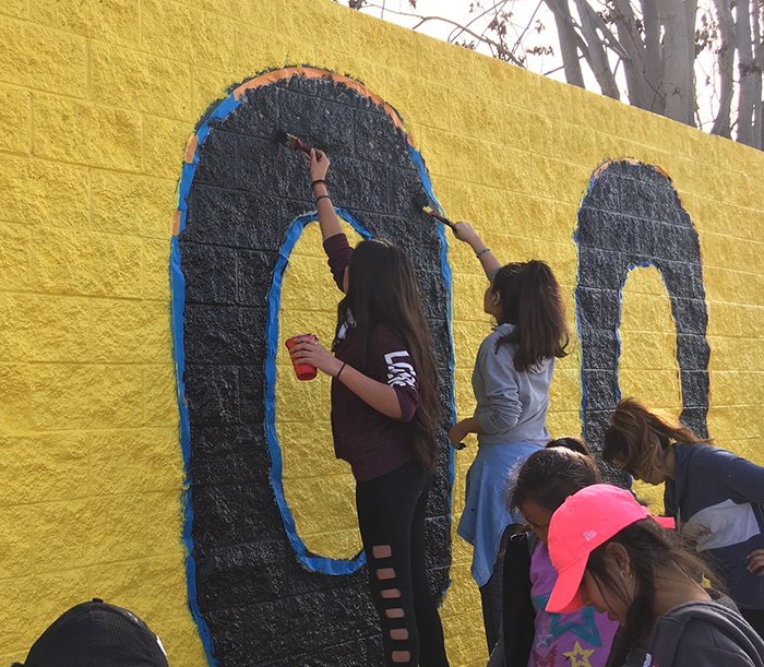 Volunteers give makeover to Compton charter school