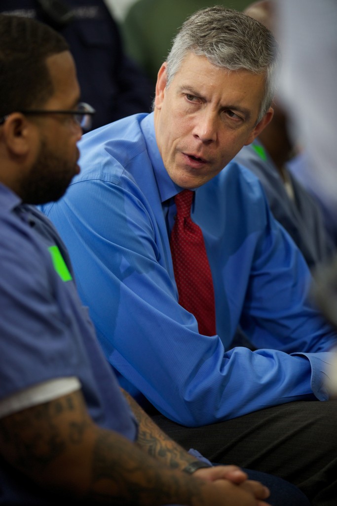 Education Secretary Arne Duncan speaks with Terrell Johnson, a participant in the Goucher College Prison Education Partnership at the Maryland Correctional Institution. (Flickr/Department of Education/CC BY 2.0)