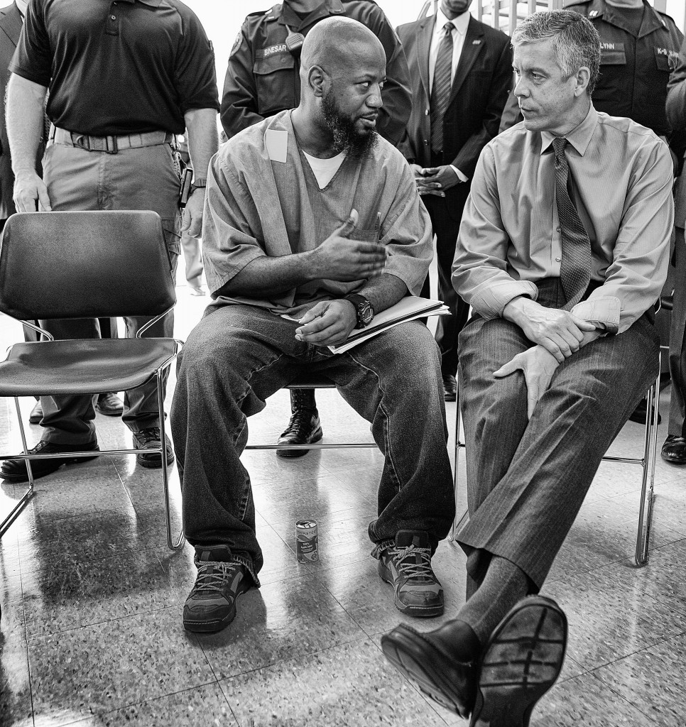 Education Secretary Arne Duncan speaks with a participant in the Goucher College Prison Education Partnership at the Maryland Correctional Institution. (Flickr/Department of Education/CC BY 2.0)