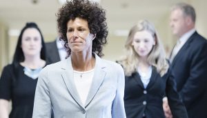 Andrea Constand walks to the courtroom during Bill Cosby's sexual assault trial at the Montgomery County Courthouse in Norristown, Pa., Tuesday, June 6, 2017. Cosby is accused of drugging and sexually assaulting Constand at his home outside Philadelphia in 2004. (Pool Photo)