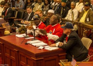 Merretazon (center) testifies in support of Resolution 120042, to determine the readiness of the City of Philadelphia to serve and assist returning soldiers from Afghanistan, Desert Storm, and Iraq, City of Philadelphia, City Council, September 11, 2012