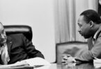 According to Dr. King, the creation of a beloved community would require the American people to address three great evils of society: racism, poverty, and militarism. Photo: President Lyndon B. Johnson meets with Martin Luther King, Jr. in the White House Cabinet Room, 18 March 1966. Lyndon Baines Johnson Library and Museum. Image Serial Number: A2134-2A. http://photolab.lbjlib.utexas.edu/detail.asp?id=18256