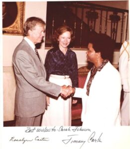Sarah Hughes Johnson is greeted by President Jimmy Carter and his wife, Rosalyn. 