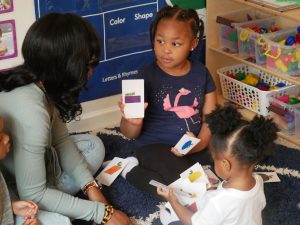 Students play a matching game at Modern Early Learning Academy. Photo by: Liz Bell, EdNC