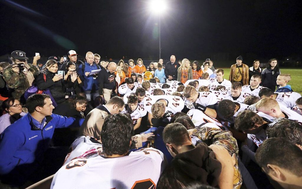 US Supreme Court to hear case of Washington football coach who led students in prayer