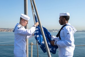 Baltimore native raises the Union Jack on the flight deck of USS Harry S. Truman