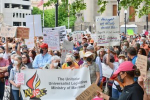 Protestors call for the protection of abortion rights at Baltimore rally