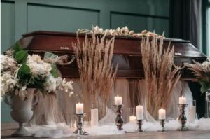 Few eligible families have applied for government help to pay for COVID funerals