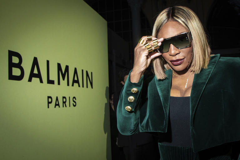 FILE - Serena Williams attends the Balmain Ready To Wear Fall/Winter 2022-2023 fashion collection, unveiled during the Fashion Week in Paris, Wednesday, March 2, 2022. After nearly three decades in the public eye, few can match Serena Williams' array of accomplishments, medals and awards. Through it all, the 23-time Grand Slam title winner hasn't let the public forget that she's a Black American woman who embraces her responsibility as a beacon for her people. (Photo by Vianney Le Caer/Invision/AP, File)