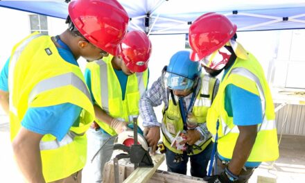 META AND HOLDER CONSTRUCTION LAUNCH HARD- HAT IN HAND IN