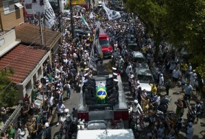 Pelé buried at cemetery in Brazilian city he made famous