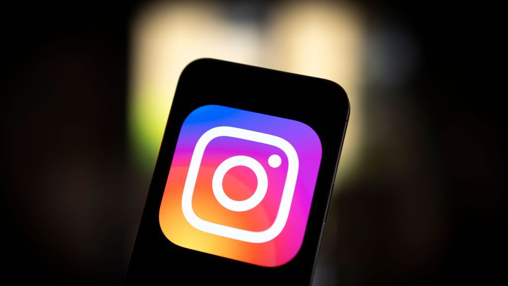 strongThe Instagram logo is seen on a mobile device in this photo illustration in Warsaw, Poland on 20 July, 2023. Instagram is preparing a substantial update to stay up with the rapidly advancing AI. The goal of this update is to distinguish between postings created by generative AI and those that were written by humans. JAAP ARRIENS/NURPHOTO/GETTY IMAGES/strong