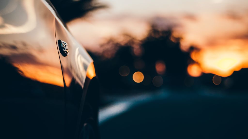 A Cadillac vehicle with the emblem driving on the highway. General Motors unveiled the Cadillac Escalade IQ, first full-size zero emissions SUV. (DAVID HURLEY/UNSPLASHED)