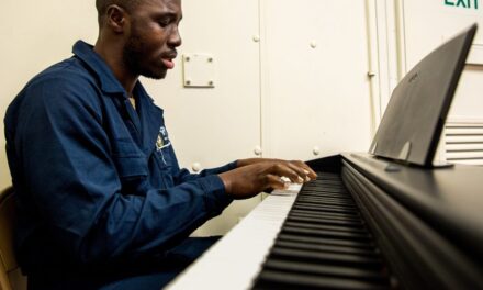 Baltimore native plays the piano aboard USS Boxer