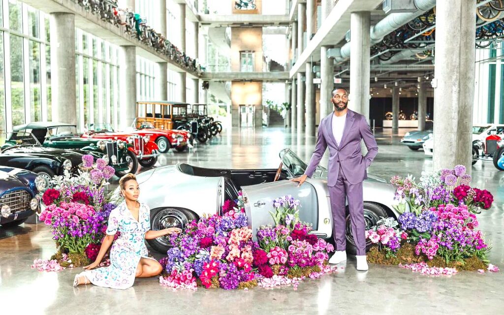 BIRMINGHAM MAYOR WOODFIN SHARES ENGAGEMENT PHOTOS WITH BARBER MOTOR-SPORTS BACKDROP