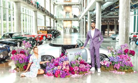 BIRMINGHAM MAYOR WOODFIN SHARES ENGAGEMENT PHOTOS WITH BARBER MOTOR-SPORTS BACKDROP