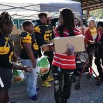 Birmingham Families Receive Full Thanksgiving Meals Ahead of the Holiday