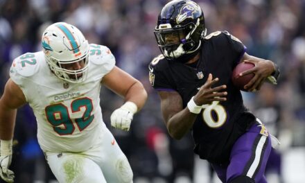 Lamar Jackson’s perfect passer rating helps Ravens rout Dolphins 56-19 to clinch top seed in AFC