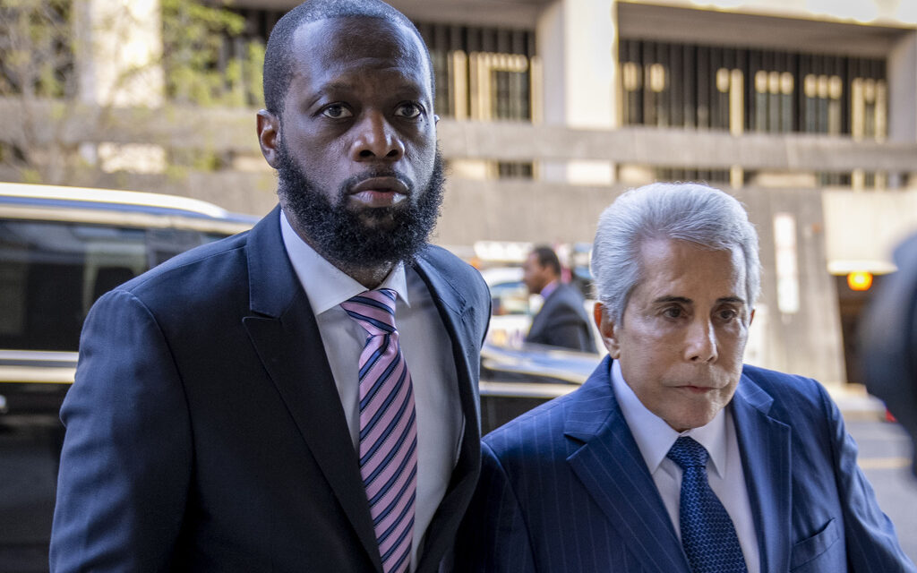 Prominent celebrity lawyer pleads guilty to leaking documents to reporters in Fugees rapper’s case