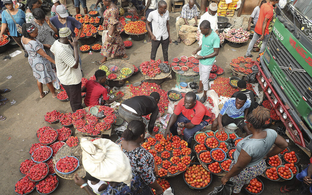 Nigeria’s currency has fallen to a record low as inflation surges. How did things get so bad?