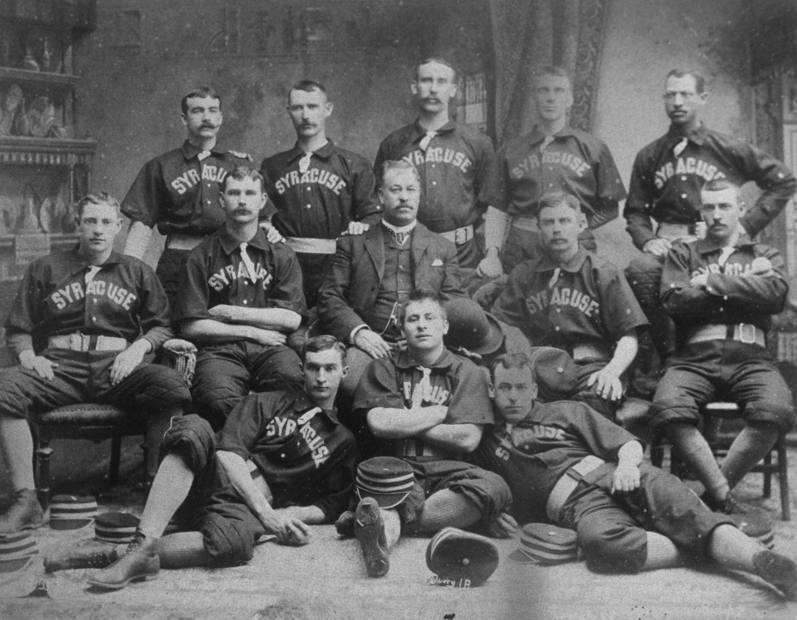 The Syracuse Stars Base Ball Club poses for a team portrait in 1889. Negro baseball pioneer Moses Fleetwood Walker is in the back row, far right.