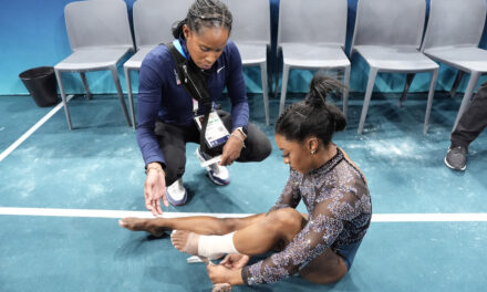 Simone Biles shakes off calf injury to dominate during Olympic gymnastics qualifying