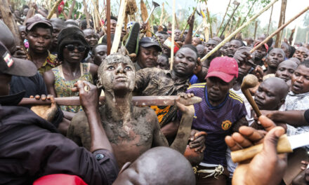 A mass circumcision is marketed to tourists in a remote area of Uganda. Some are angrily objecting