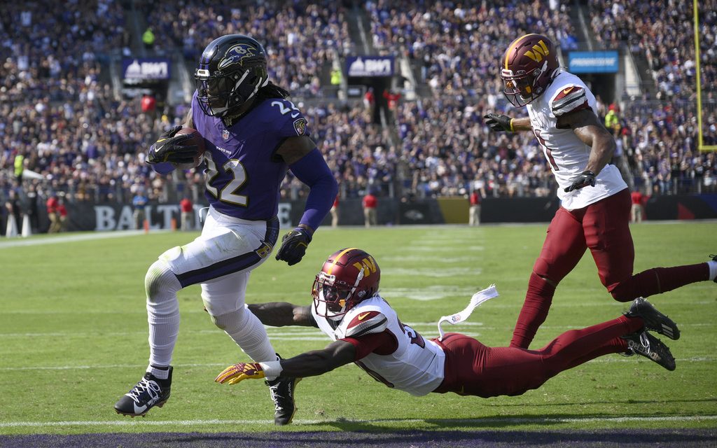 Jackson outduels Daniels and Henry runs for two TDs as Ravens beat Commanders 30-23