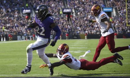 Jackson outduels Daniels and Henry runs for two TDs as Ravens beat Commanders 30-23