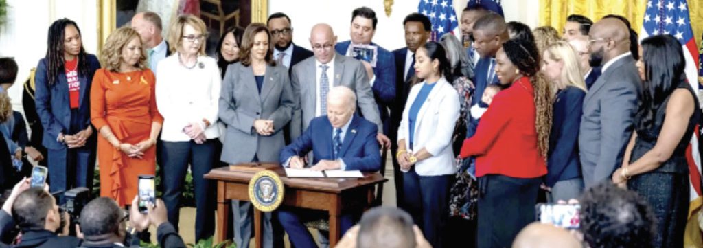 Mayor Woodfin joins Biden, Harris to sign executive order against gun violence