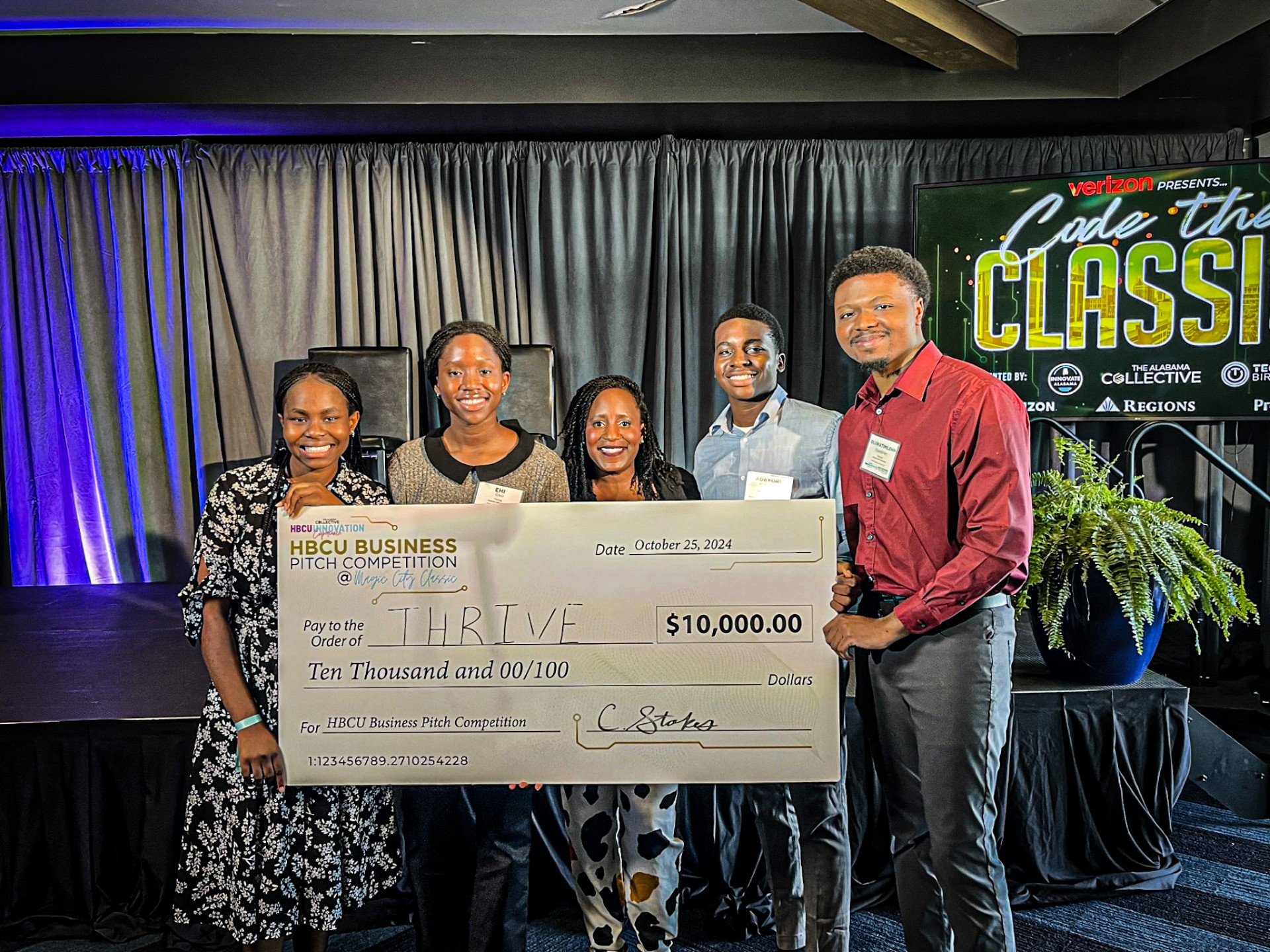 AAMU Students Hold $10,000 First Prize Check for Winning HBCU Business Pitch Competition 2024