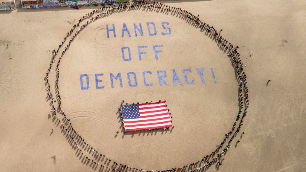 Protesters denounce 47th president and billionaire ally in ‘Hands Off!’ rallies across the US