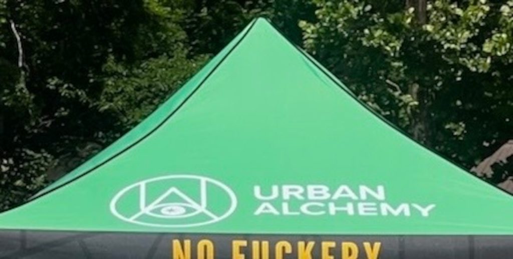 Profanity on Banner at Homeless Outreach Booth Sparks Backlash at Birmingham Farmers Market