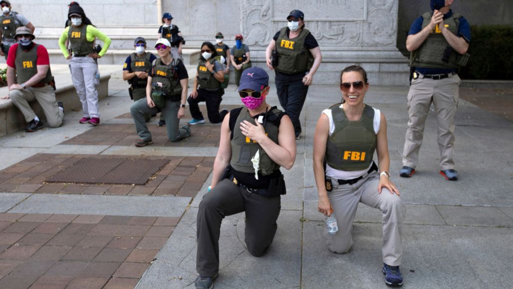 FBI fires agents photographed kneeling during 2020 racial justice protest, AP sources say