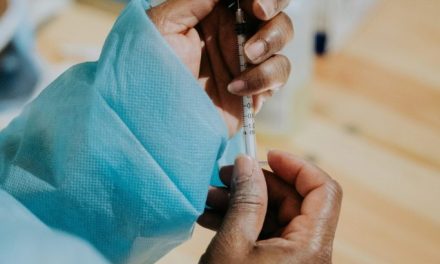 What polls show about Americans’ views on childhood vaccine mandates