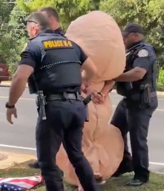 Woman Arrested for Inflatable Costume at Alabama ‘No Kings’ Rally Sparks Free Speech Debate