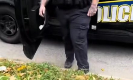 Baltimore police officer indicted after viral video shows him trying to hit man with patrol car