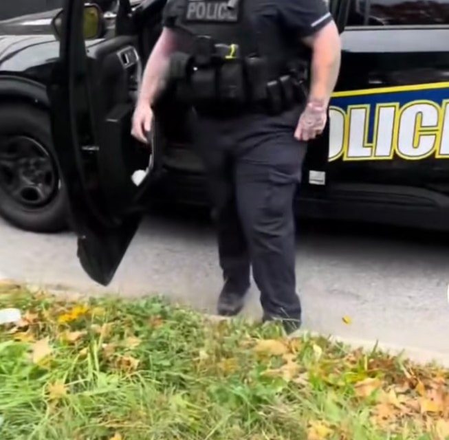 Baltimore police officer indicted after viral video shows him trying to hit man with patrol car