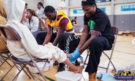 Baltimore Ravens’ gift to schoolkids: Clean feet and new kicks